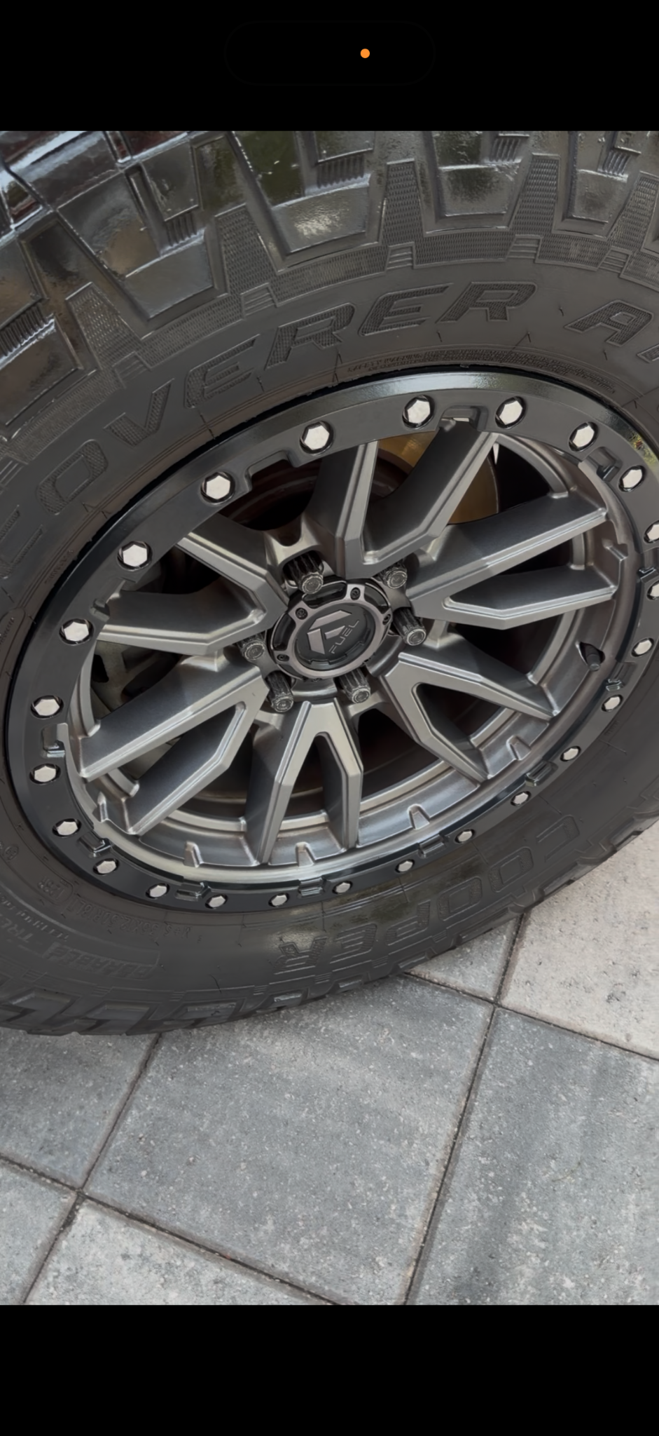 Clean off-road wheel and dressed tire after detailing